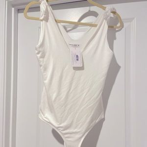 White bodysuit from local boutique